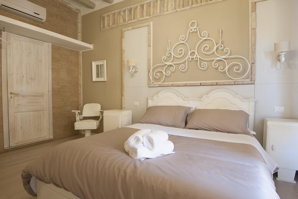 Cento Suites Κάλιαρι Δωμάτιο φωτογραφία