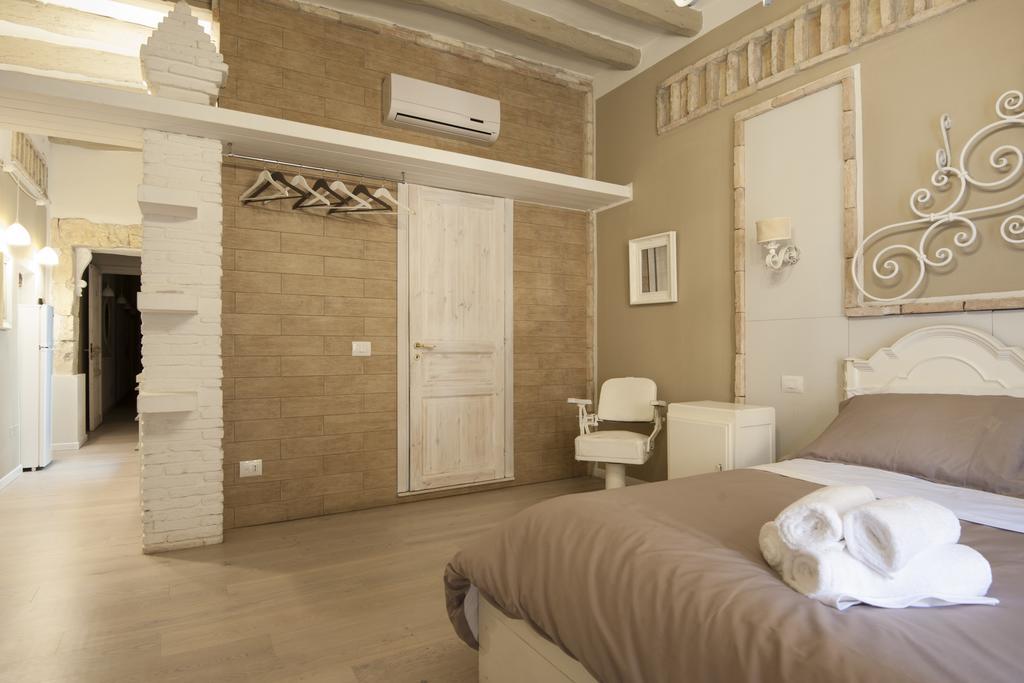 Cento Suites Κάλιαρι Δωμάτιο φωτογραφία